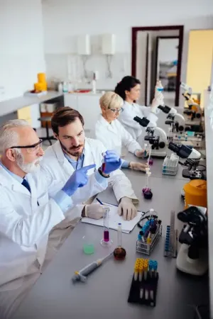 Researchers in a calibration testing laboratory.