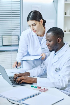 scientists examine biobank sample