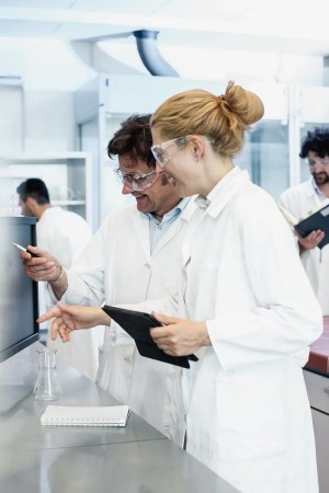 scientists ensuring quality management and proficiency testing
