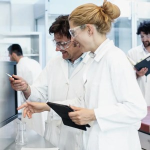 scientists ensuring quality management and proficiency testing