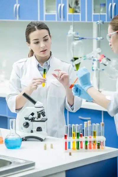 chemists examining medical samples in a lab