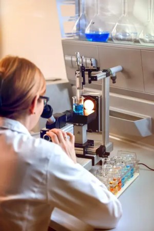 Laboratory researcher validating and verifying methods.