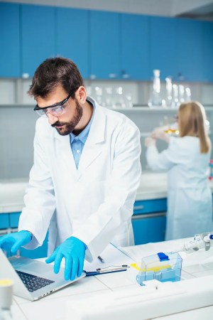 scientists using a quality management system