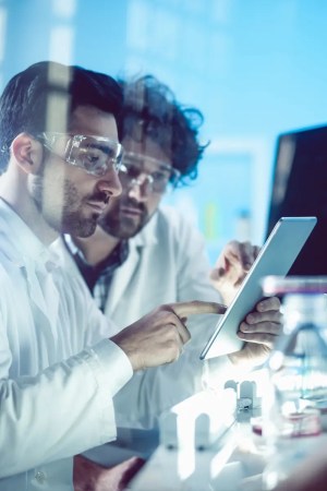 forensics scientists examining tests