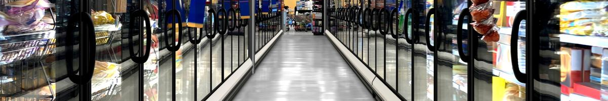 person standing by commercial refrigerator