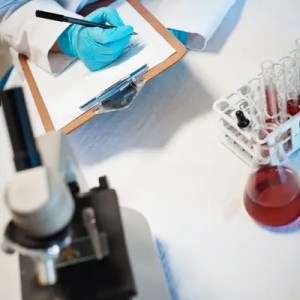 forensic assessor in a laboratory.