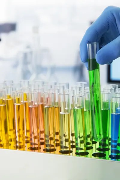 Colorful test tubes in a lab.