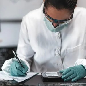 forensic technical assessor in a laboratory