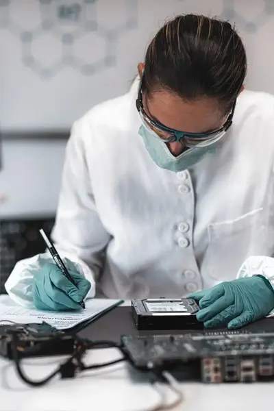 forensic technical assessor in a laboratory