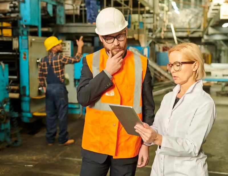 Inspection bodies in a factory performing conformity assessment.